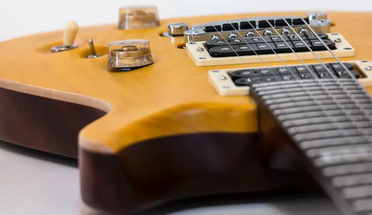How Do You Tune A 6-String Guitar To An Open E?